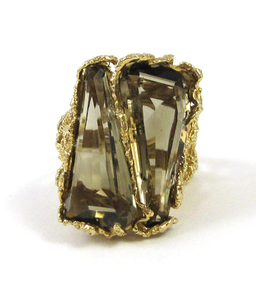 Appraisal: SMOKY QUARTZ AND FOURTEEN KARAT GOLD RING The heavy ring