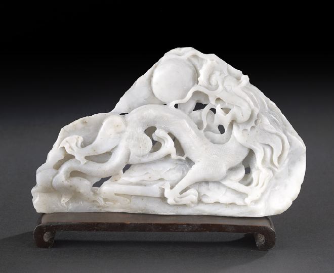 Appraisal: Chinese Carved White Jade Dragon Group carved in relief as