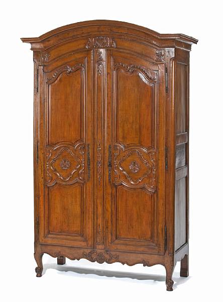 Appraisal: A Louis XV fruitwood armoire mid th century The arched