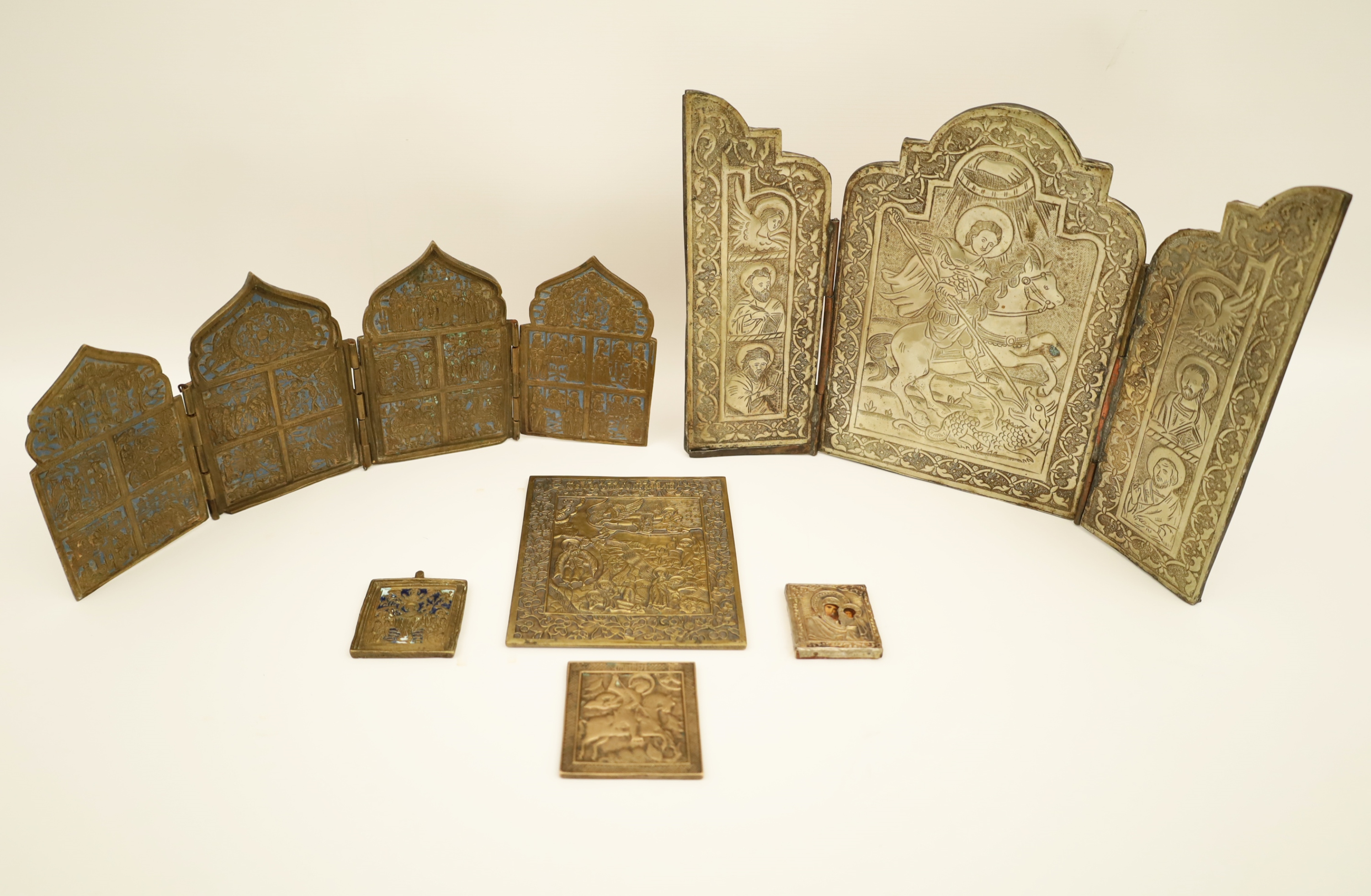 Appraisal: GROUP OF RUSSIAN ICONS Including a brass and enamel quadtych