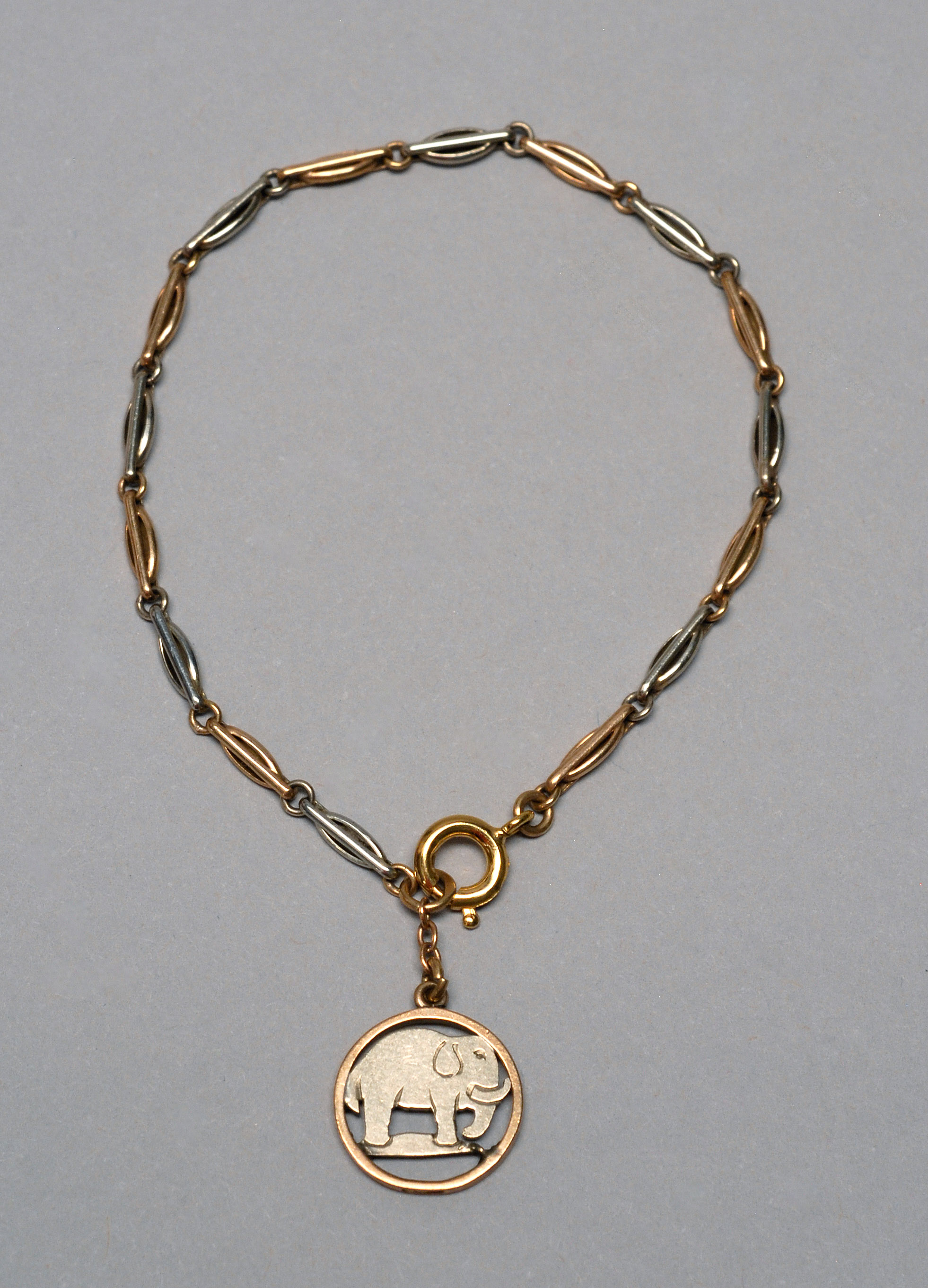 Appraisal: TWO-TONE GOLD-FILLED CHILD'S BRACELET With openwork pendant in an elephant