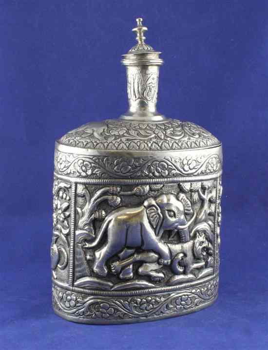 Appraisal: An Indian white metal oval vessel with stopper decorated with