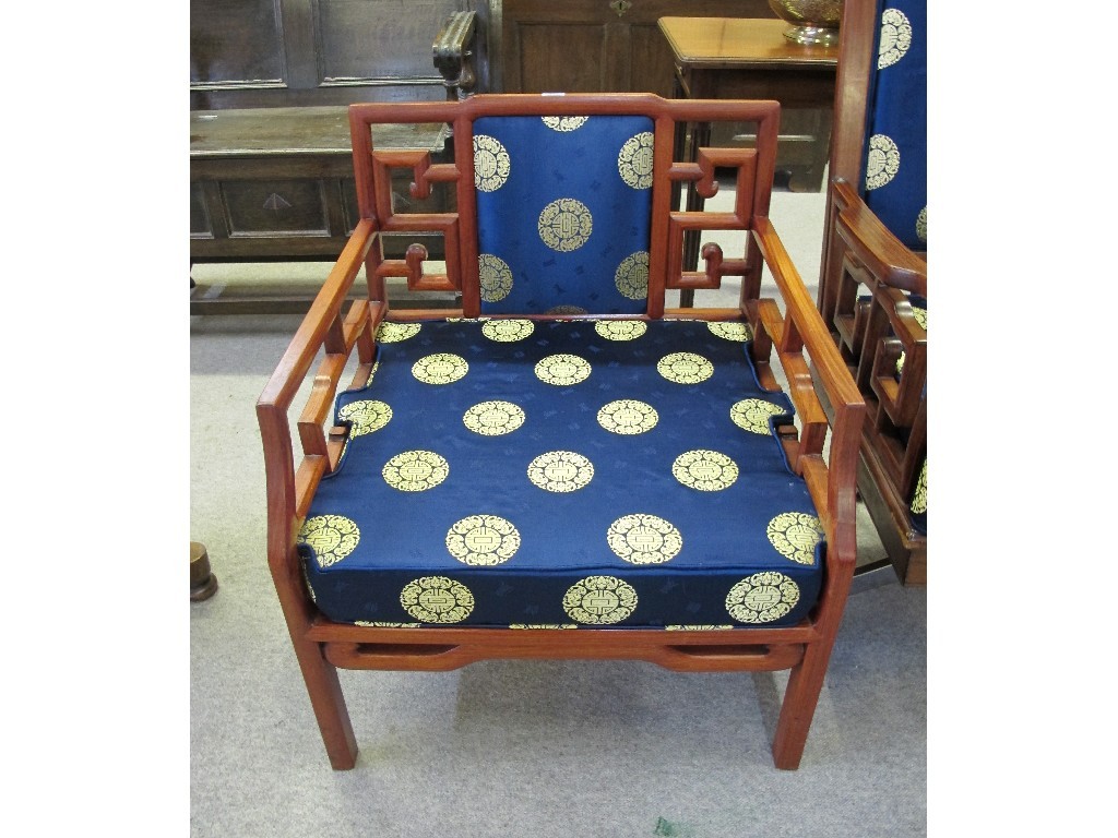 Appraisal: Pair of Chinese style hardwood armchairs