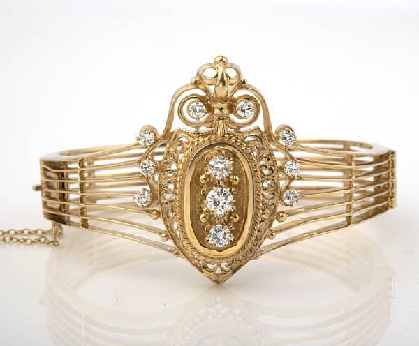 Appraisal: A diamond bangle estimated total diamond weight carats weighing approximately