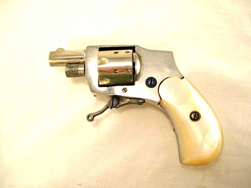 Appraisal: Baby Hamerless Pocket Revolver Nickel plate patent pearl grips one