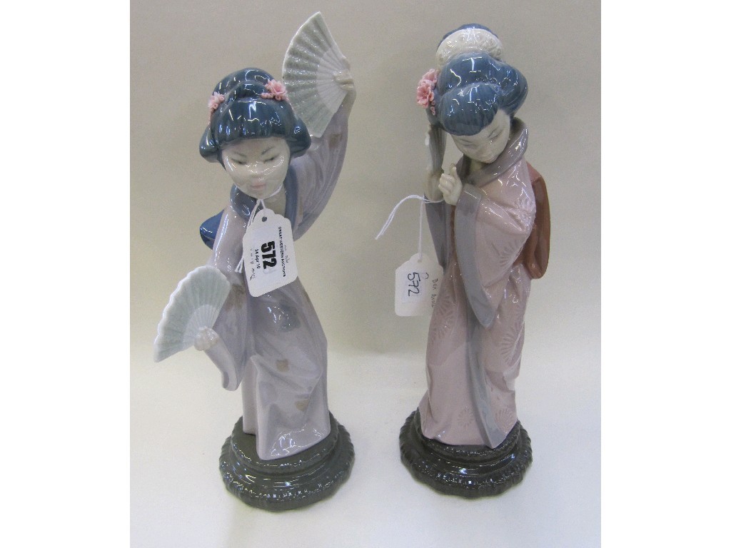 Appraisal: Two Lladro figures of geishas boxes available