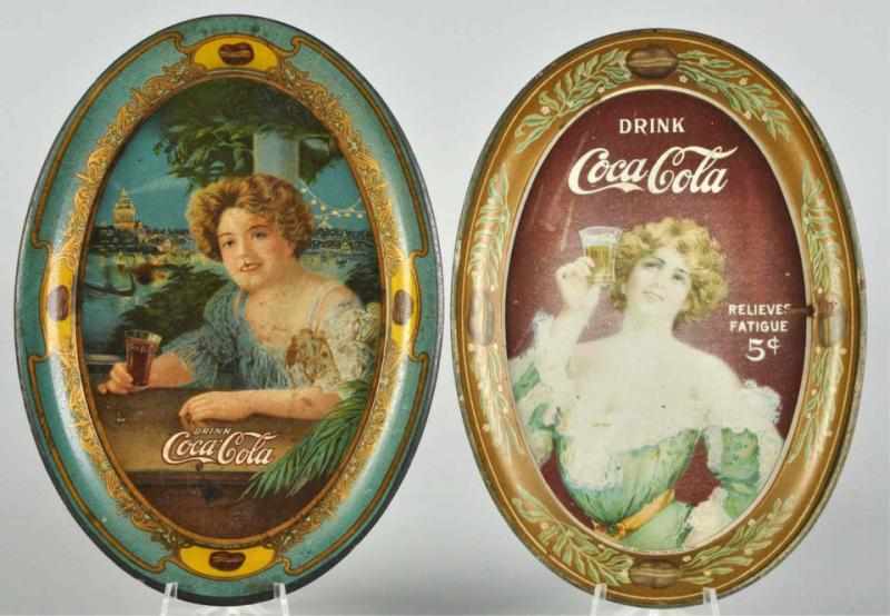 Appraisal: Coca-Cola Change Trays Description Both are darkened faded have surface