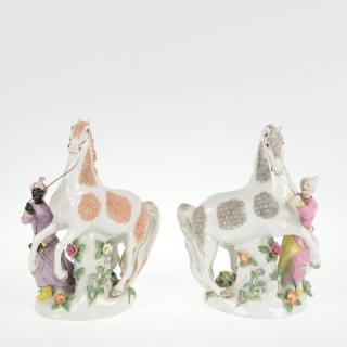 Appraisal: Pair Meissen style figure groups horses and Moors th c