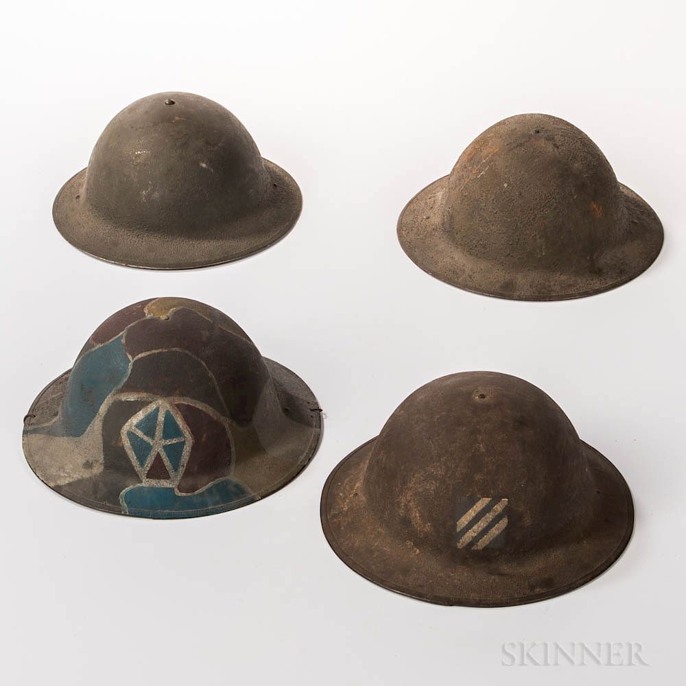 Appraisal: Four WWI-era Helmets Four WWI-era Helmets c - a helmet