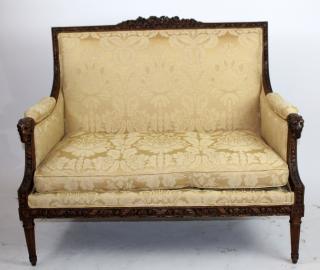 Appraisal: French Louis XVI carved walnut settee with rams heads French