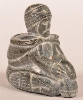 Appraisal: Eskimo Stone Carving of a Parka Clad Figure Eskimo Stone