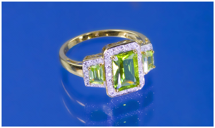 Appraisal: ct Gold Diamond Ring Set With A Central Peridot And