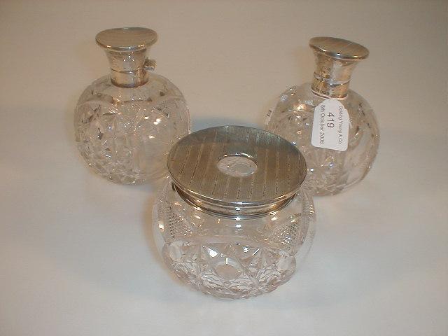 Appraisal: A pair of George V cut glass scent bottles with