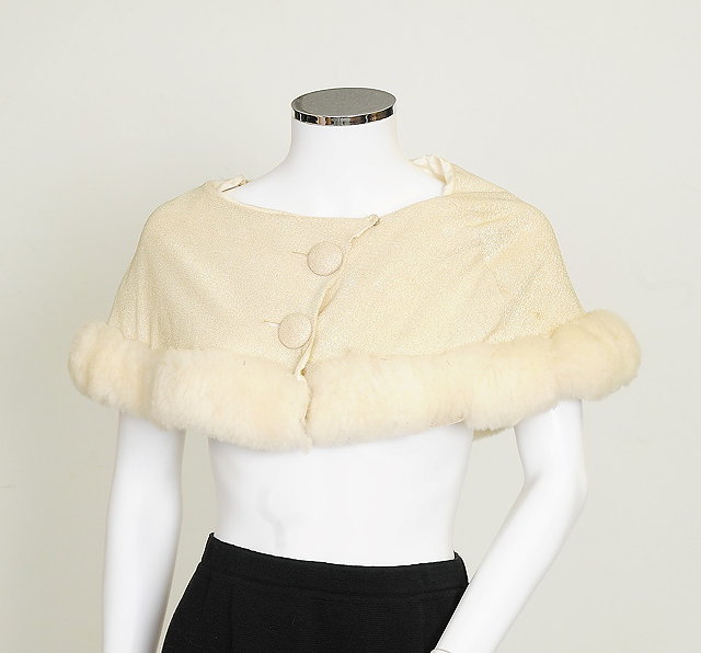 Appraisal: A s small cream and silver shrug with cream wool