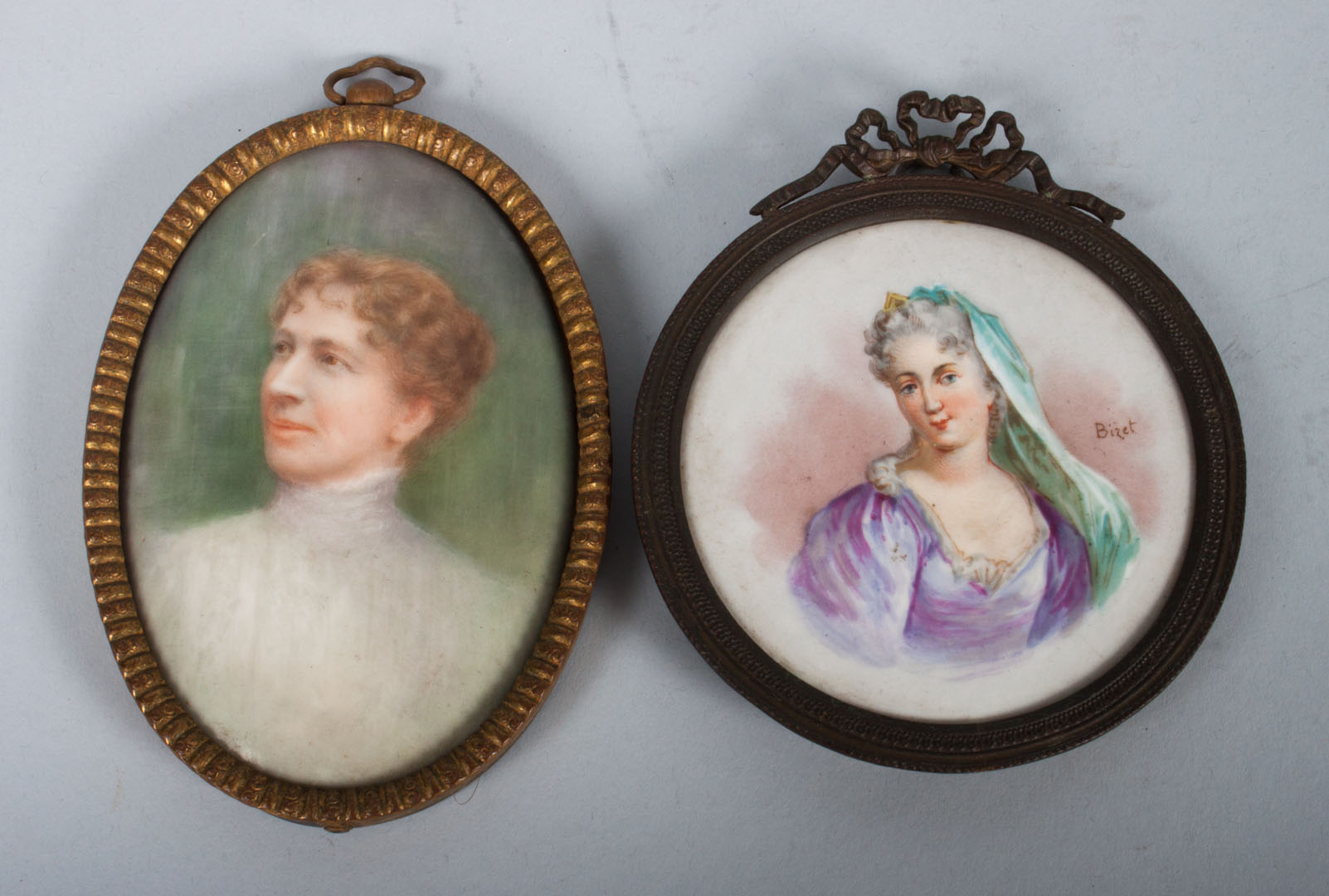 Appraisal: Two miniature portraits on porcelain American School late th early