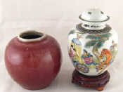 Appraisal: Chinese ceramics A covered vase the white body with overglaze