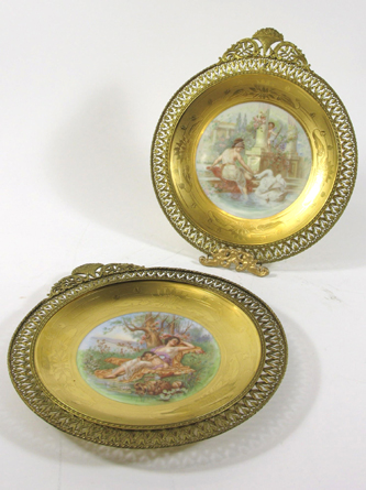 Appraisal: PAIR AMERICAN OSBORNE ART STUDIO GOLD EMBELLISHED AND FRAMED PLATES