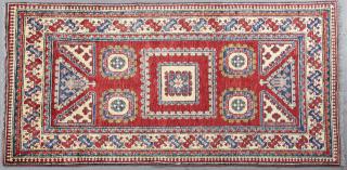 Appraisal: Uzbek Kazak Carpet ' x ' Uzbek Kazak Carpet '