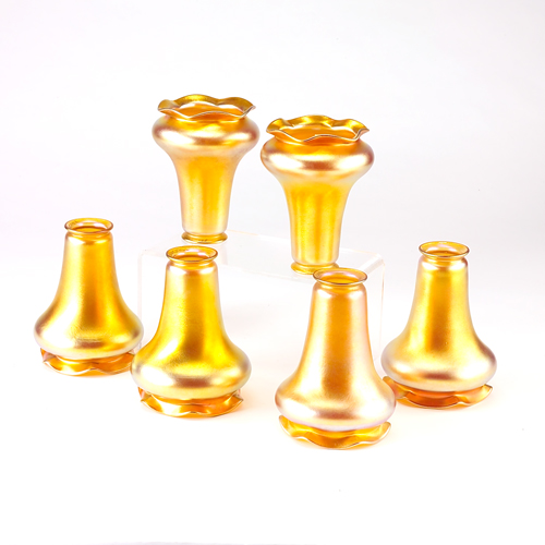 Appraisal: QUEZAL Set of six gold glass trumpet lamp shades with