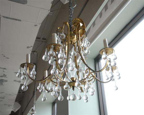 Appraisal: A Brass and Glass Six Arm Chandelier the brass framework