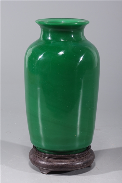 Appraisal: Chinese green Beijing glass vase with wood stand overall good