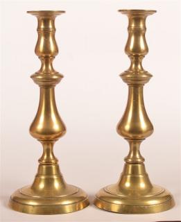 Appraisal: Pair of th Century Brass Candlesticks Turned bulbous standards and