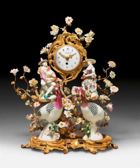 Appraisal: MANTEL CLOCK WITH PORCELAIN FIGURES Louis XV style the dial