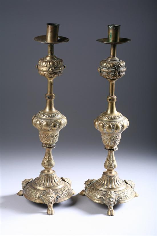 Appraisal: PAIR CONTINENTAL GILT-BRONZE CANDLESTICKS th century Circular base on three