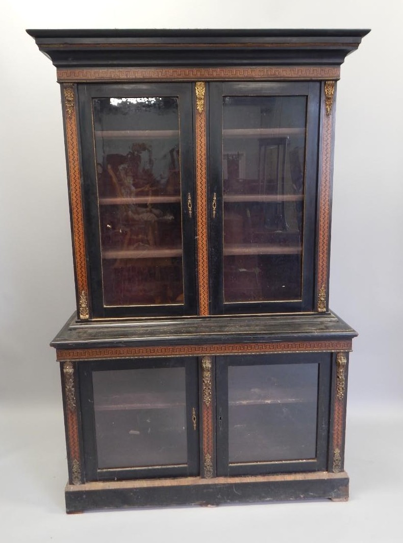 Appraisal: A Victorian and ebonised and parquetry bookcase with gilt metal