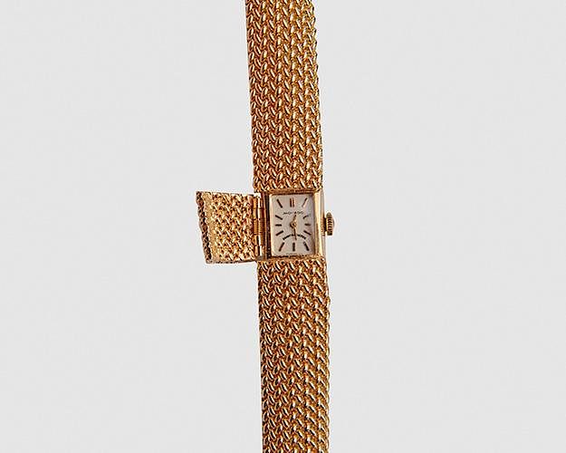 Appraisal: MOVADO and GRANT A PEACOCK K Yellow Gold Covered Wristwatch