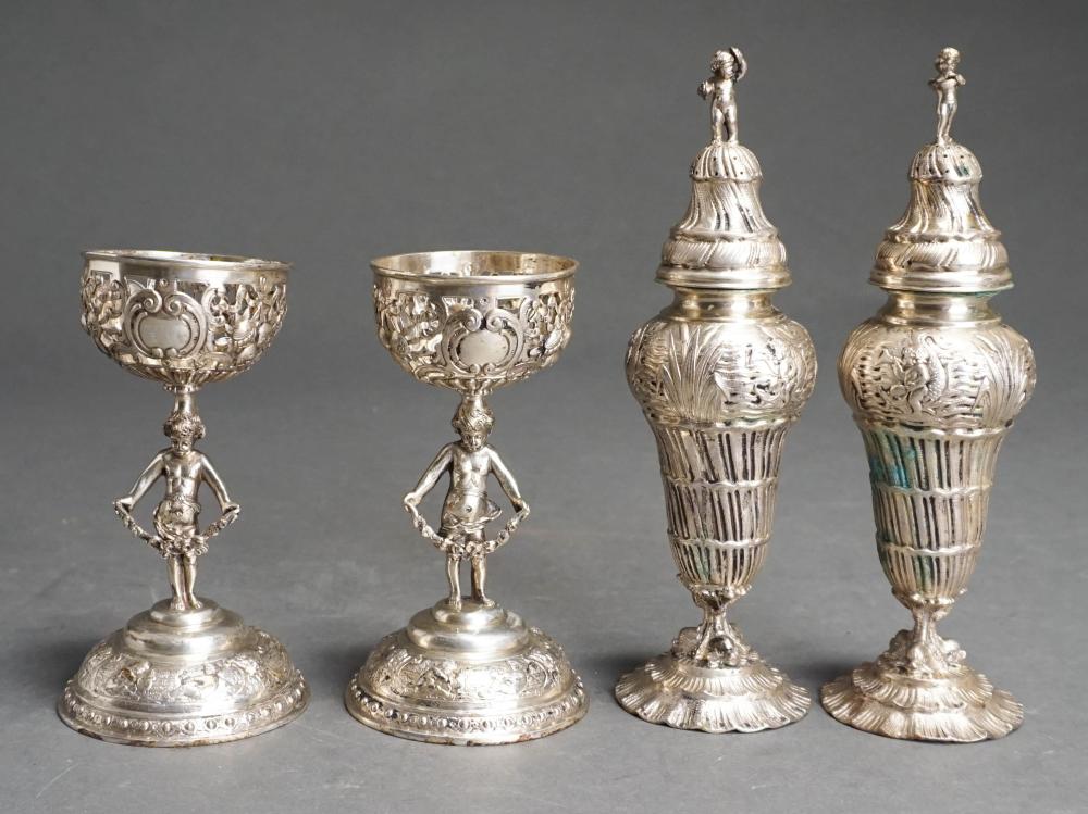 Appraisal: PAIR GERMAN ROCOCO STYLE -SILVER CASTERS AND PAIR PUTTO STEM