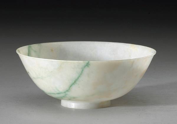 Appraisal: A jadeite bowl Late Qing Dynasty Republic Period Carved with