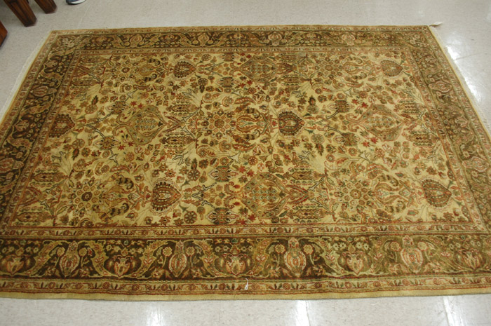 Appraisal: HAND KNOTTED ORIENTAL WOOL CARPET Indo-Persian overall floral design on