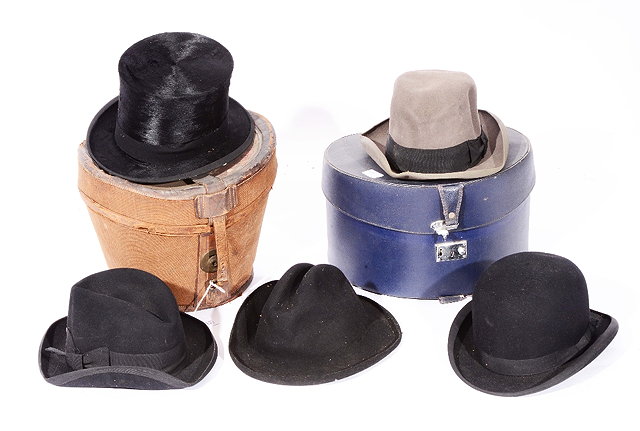 Appraisal: A BLACK SILK TOP HAT by Woodrow Piccadilly London in