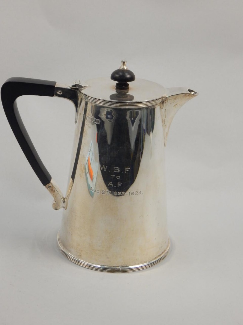 Appraisal: A George V silver hot water jug of tapering form