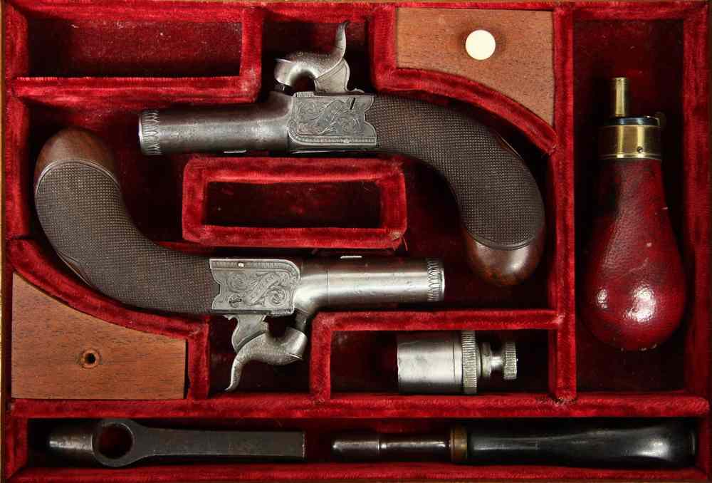 Appraisal: CASED PAIR ENGLISH MUFF PISTOLS - Cased Pair of Percussion