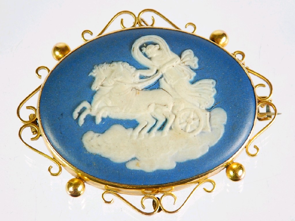 Appraisal: ct GOLD MOUNTED WEDGWOOD BLUE AND WHITE JASPERWARE CAMEO BROOCH