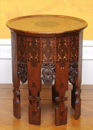 Appraisal: MOORISH-STYLE PAINTED AND CARVED HARDWOOD OCCASIONAL TABLE The round molded