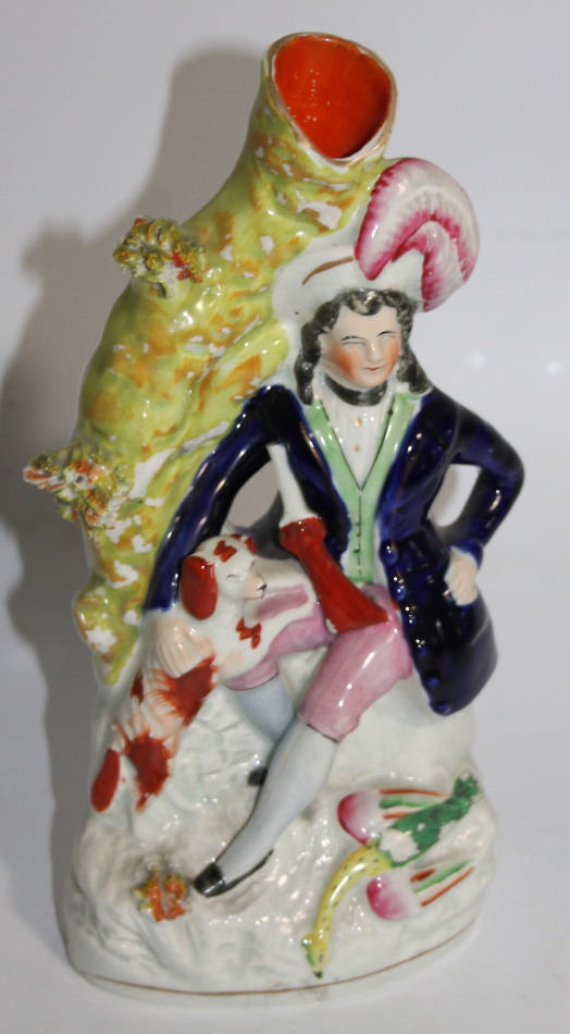 Appraisal: A thC Staffordshire flatback spill vase of a gentleman huntsman