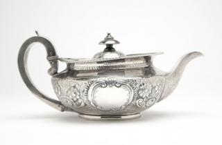 Appraisal: A George III sterling silver teapot London maker's mark of