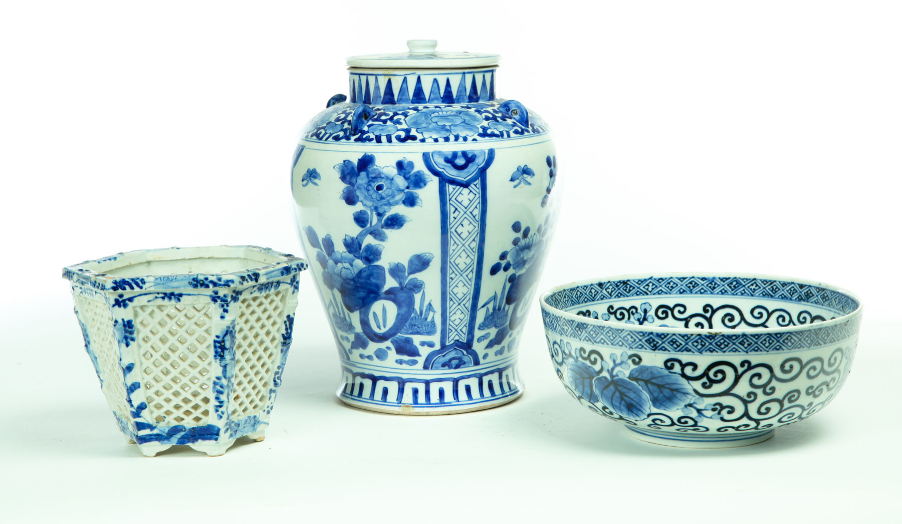 Appraisal: THREE BLUE AND WHITE CERAMIC PIECES China th century Reticulated