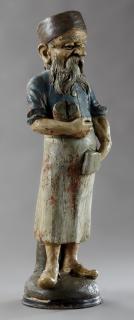 Appraisal: French Polychromed Earthenware Figure th c of a shopkeeper on