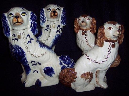 Appraisal: Two pairs of dogs one blue and white with gilt