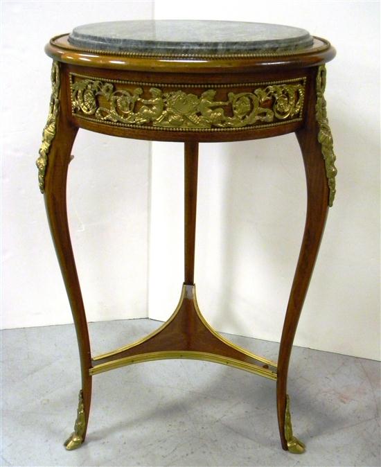 Appraisal: French stand round inset marble top pierced gold-colored metal frieze