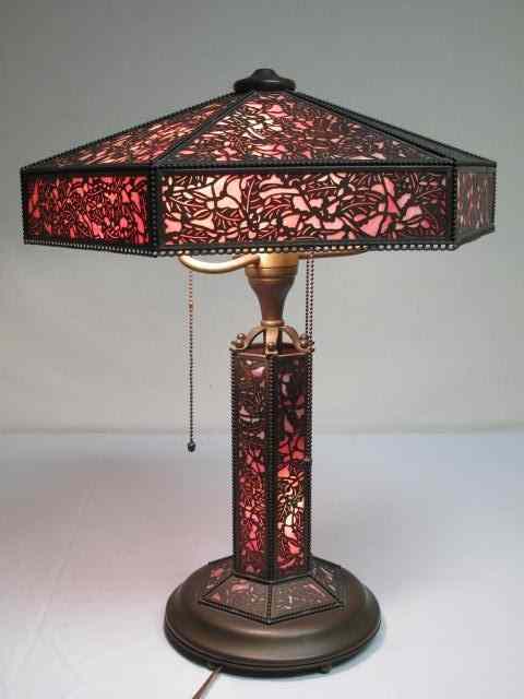 Appraisal: An unusually fine American slag glass lamp with intricate filigree