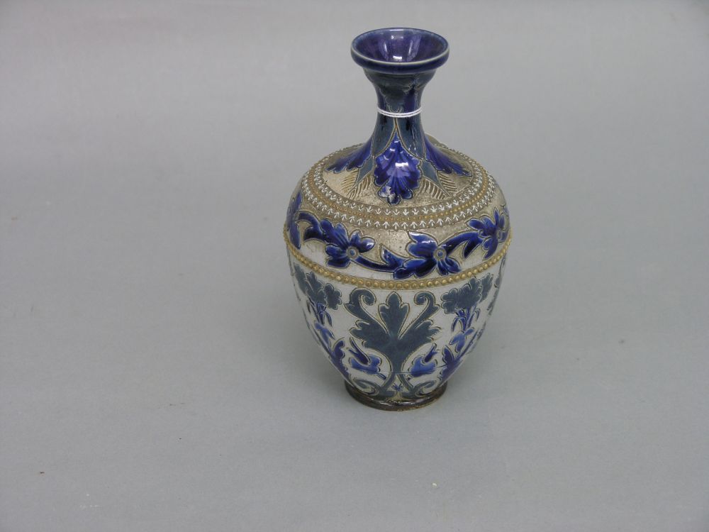 Appraisal: A Doulton Lambeth stoneware vase incised design of leaves and