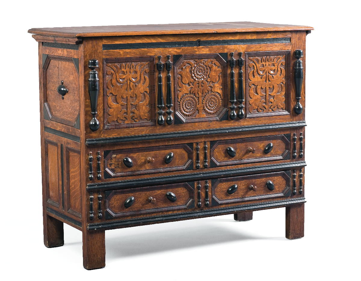 Appraisal: CONNECTICUT CARVED OAK SUNFLOWER CHEST The rectangular hinged top with