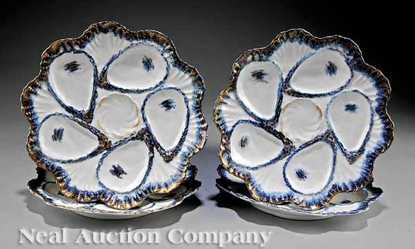 Appraisal: Four Weimar Porcelain Cobalt and Gilt-Decorated Oyster Plates each with