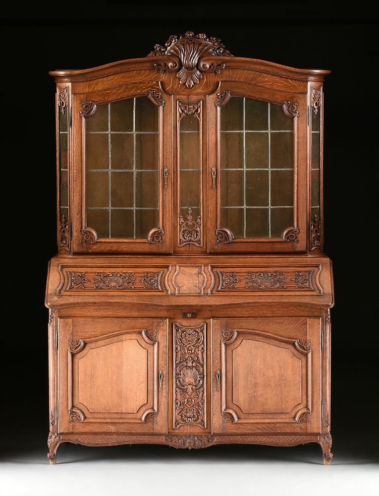 Appraisal: A LARGE LOUIS XV STYLE CARVED OAK BUREAU BIBLIOTH QUE