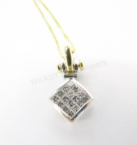 Appraisal: An K yellow and white gold pendant with twelve invisible